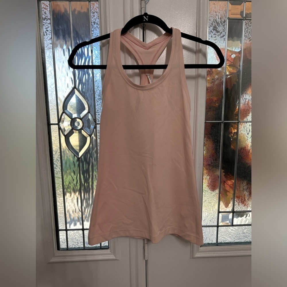 Lululemon Cool Racerback tank size 4 in pink mist (flawed).